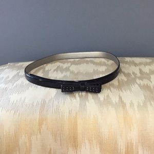 Black patent leather skinny belt